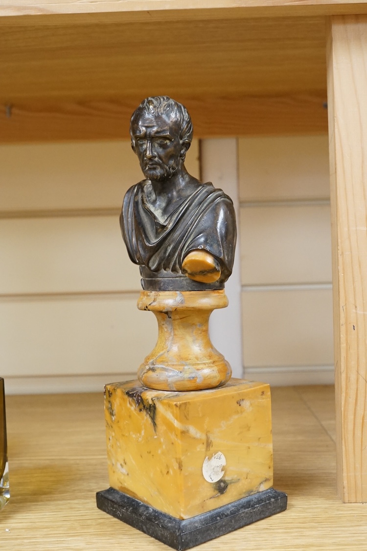 A bronze bust of a philosopher raised on square marble base, 27cm high